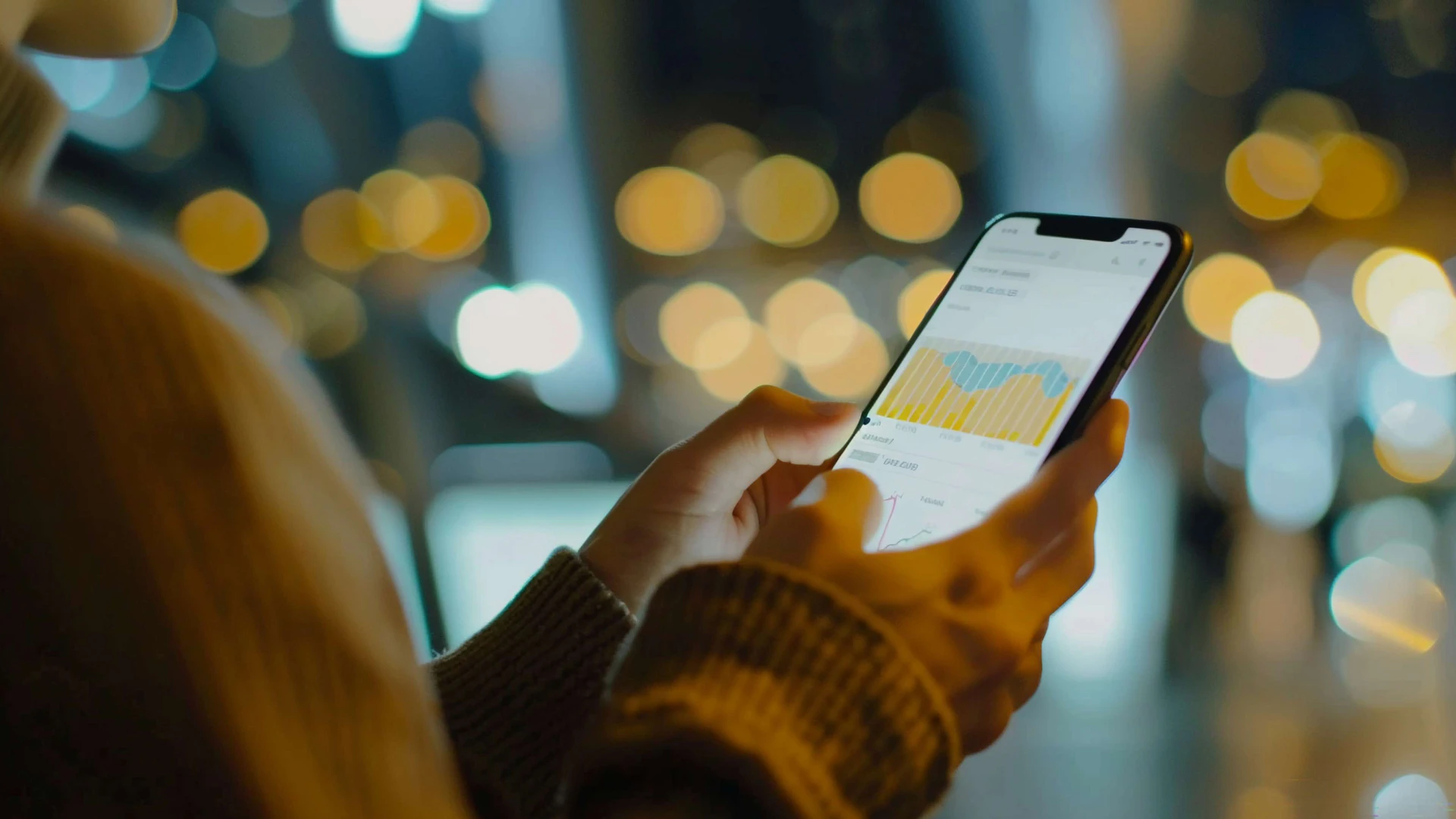Aplikasi investasi emas digital di smartphone.