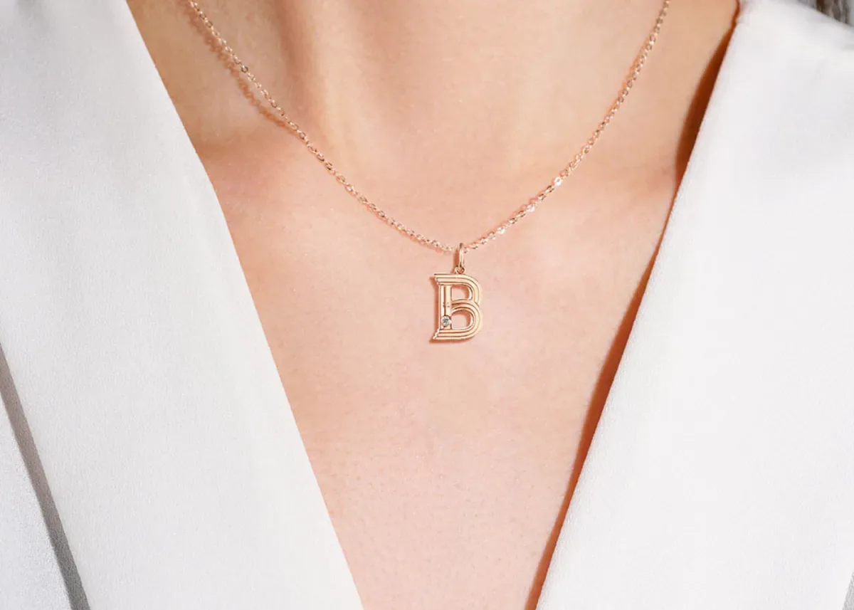 Kalung Emas Huruf Asli