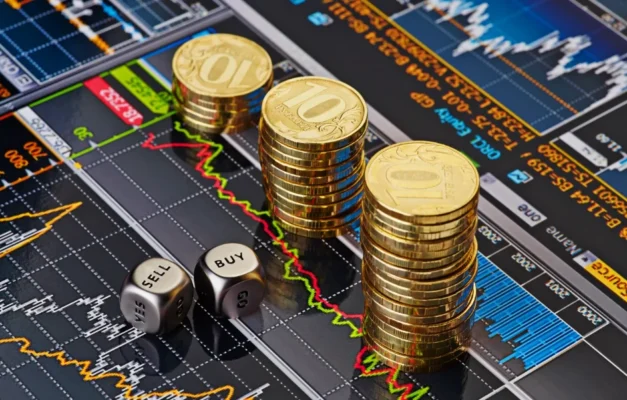 penyebab harga emas turun